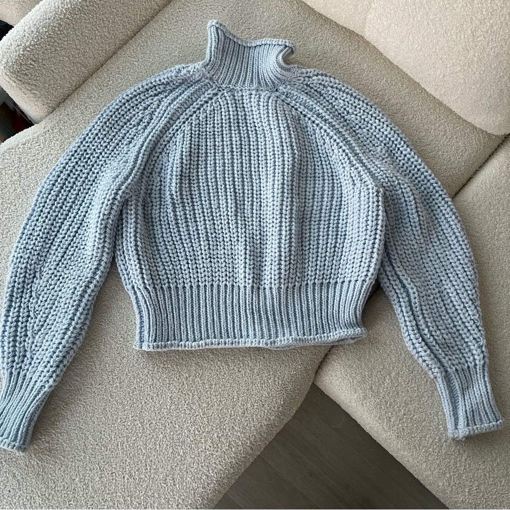 Sweater knitted light blue